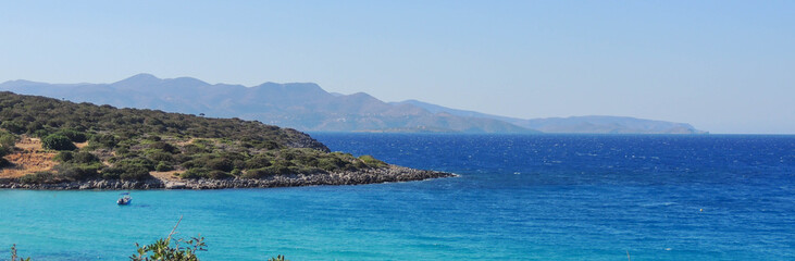 Fototapeta na wymiar Blue lagoon, island paradise. Adriatic Sea of Crete, Greece, popular touristic destination banner