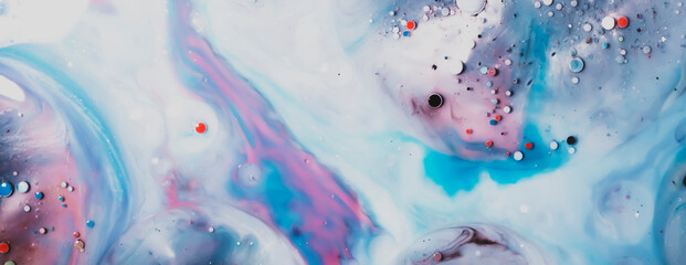 beautiful background of paint bubbles floating on water with mix of oil colors