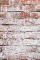 texture of old red brick wall on an abandoned building
