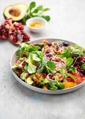 Orange-grapefruit salad with pomegranate seeds