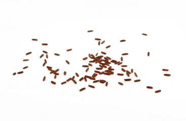 Red wild rice pile isolated on white background