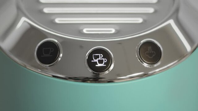 Coffee machine turning on with icons blinking