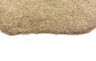 Dry spelt bran pile isolated on white background. Powder Organic Spelt Bran.
