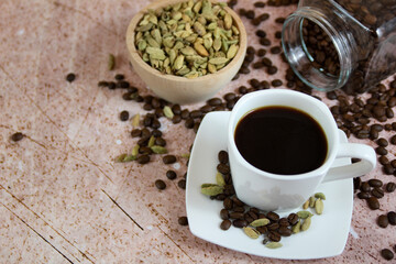 Coffee with cardamom in a white cup