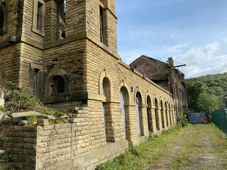 Derelict Victorian stone built textile mill near, Dalton Lane, Keighley, UK