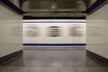 Urban transport wagon moving with an empty aisle.