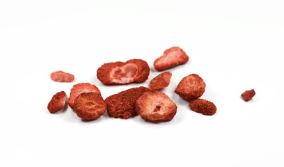 Group of home cooked dehydrated dry strawberries isolated on white background top view. Dried homemade sliced organic strawberry berries close up