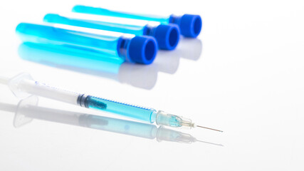 Syringe injection. Medical syringe with needle for protection flu virus and coronavirus. Covid vaccine isolated on white. Nurse or doctor. Liquid drug or narcotic.