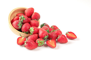 Strawberries in a wooden bowl  isolated on white background.