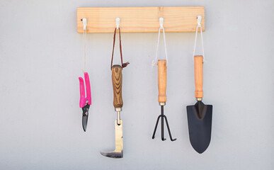 Gardening tools on the wooden dock