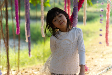 Portrait Asian Thailand kids cute little girl In white dress