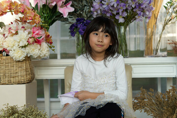 Portrait Asian Thailand kids cute little girl In white dress