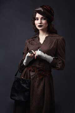Woman in retro style of 1920s years.