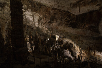 dark image of Postojna grotte in Slovenia