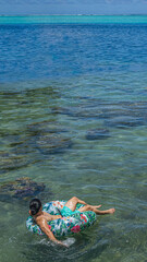 Fototapeta na wymiar person relaxing on the beach