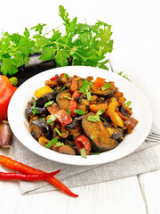 Ragout with eggplant and pepper on napkin