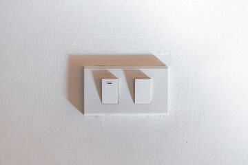 light switch on white wall