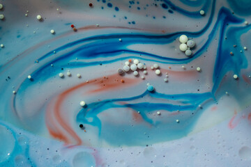 Painted Galaxy Art Created in Oil and Milk. Galaxies evolve in this artistic science experiment....