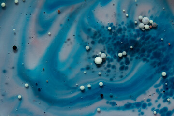 Painted Galaxy Art Created in Oil and Milk. Galaxies evolve in this artistic science experiment....