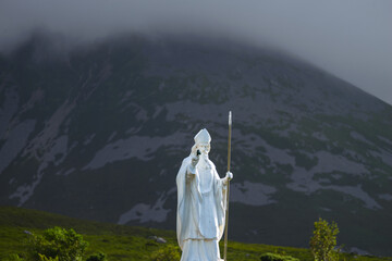 Monument to Croagh Patrick, nicknamed the Reek in County Mayo after Mweelrea and Nephin, Ireland