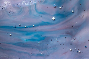 Painted Galaxy Art Created in Oil and Milk. Galaxies evolve in this artistic science experiment....