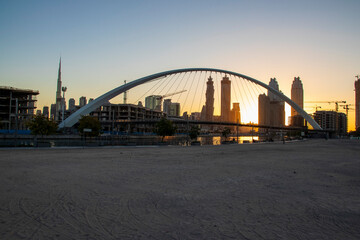 Dubai, UAE - 01.08.2021 Bridge over a Dubai Water canal known as Tolerance bridge. Outdoors