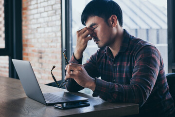 sad depression serious people from work,study stress concept.asian man feeling tired suffering...