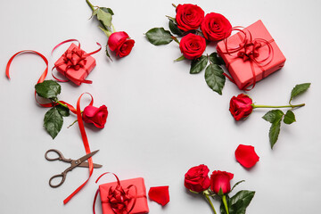 Composition with beautiful red roses and gifts on white background