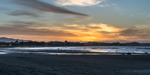 Sunset on Fitzroy beach on the north island of New Zealand