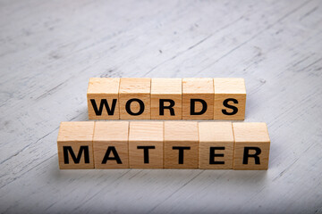 wooden blocks  in a white and grey board with the text words matter