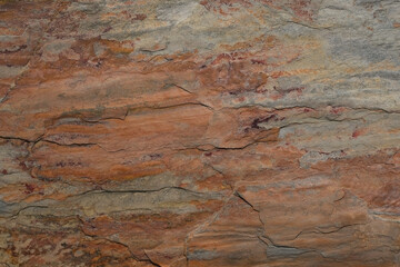 Rust stone wall or stone corrosion by weathered use for stone background