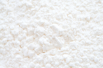 Fototapeta na wymiar Close up white texture of rice flour powder in top view use for food and ingredient background