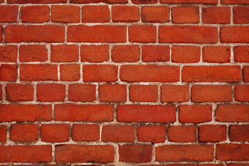 Obraz premium Background of an old brick red wall.