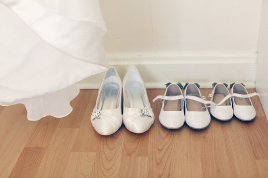 High Angle View Of Shoes On Hardwood Floor