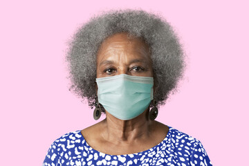 Mature woman wearing mask psd mockup for Covid-19 prevention cam