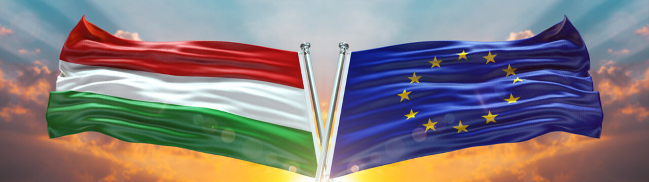 Double Flag  European Union and  Hungary flag waving flag with texture sky clouds and sunset background	