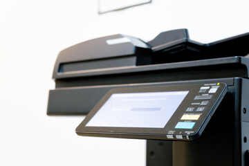 The photocopier or network printer is office worker tool equipment for scanning and copy paper.