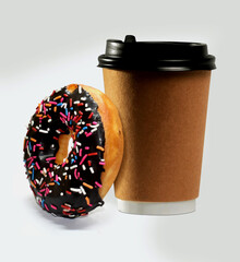 Colorful sprinkle chocolate donut and paper cup on white background