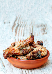 Chicken wings surrounded by rustic background