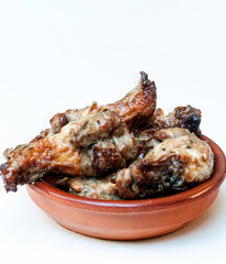 Chicken wings surrounded by white background