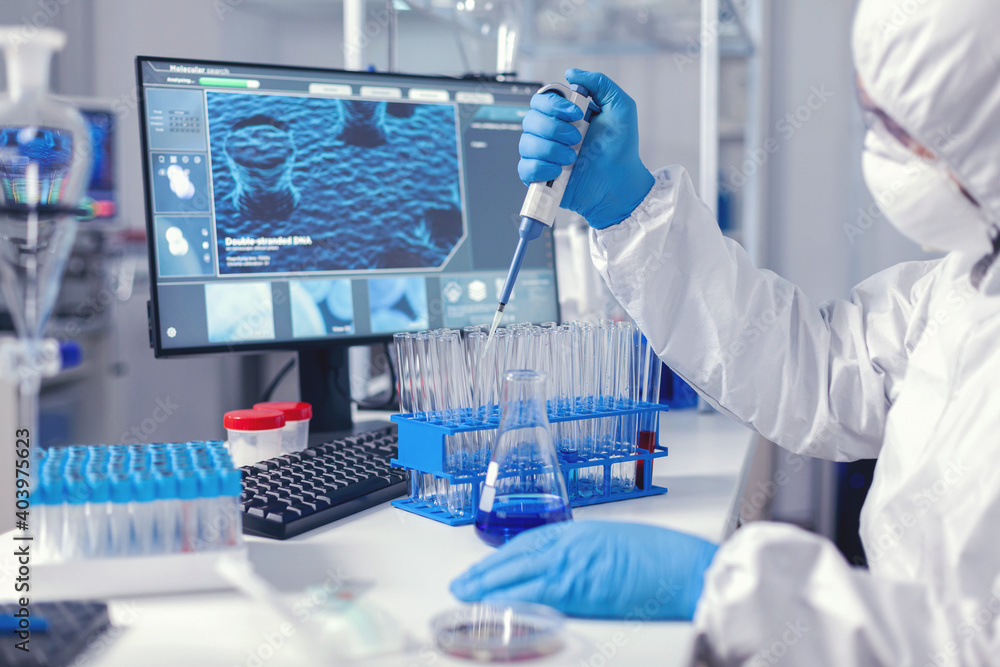 Aufkleber medic assistant working in biochemistry lab working with automatic pipette wearing protection suit. 