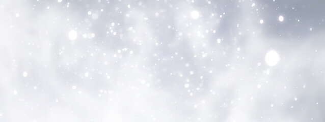 blue snowfall bokeh background, abstract snowflake background on blurred abstract blue