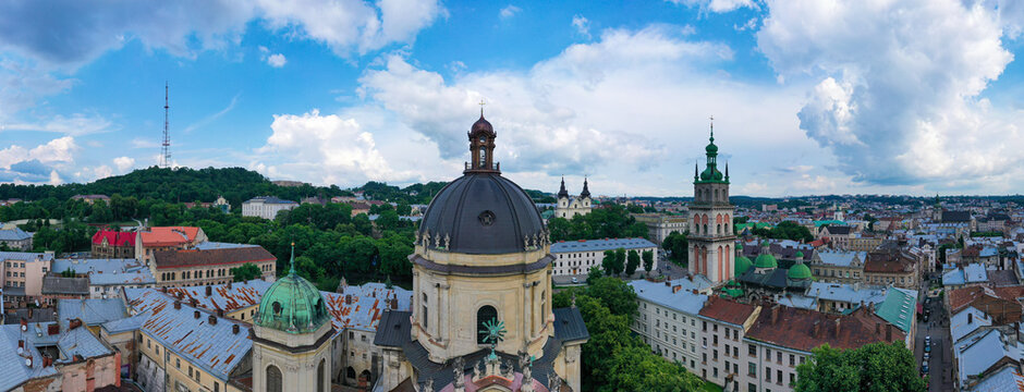  Aerial view on Market square, Dormition, Dominican and Carmelite Church in Lviv, Ukraine from drone