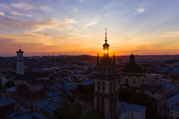 Fototapeta premium Aerial view on Dominican Church and Dormition Church in Lviv, Ukraine from drone