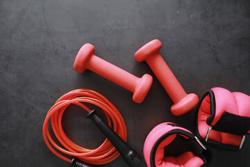 Sport and healthy lifestyle. Accessories for sports. Yoga mat dumbbell and jump rope. Sports...