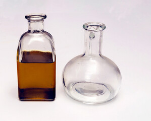 Bottle of olive oil surrounded by white background