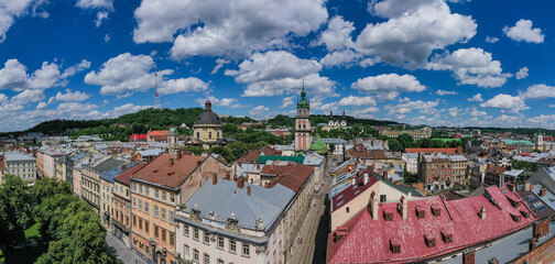 Aerial view on Market square, Dormition, Dominican and Carmelite Church in Lviv, Ukraine from drone