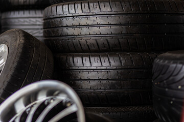 Obraz premium Car tires rack showing for sell or fix in the shop