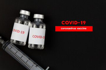 Corona virus vaccine in bottles. The medical concept.