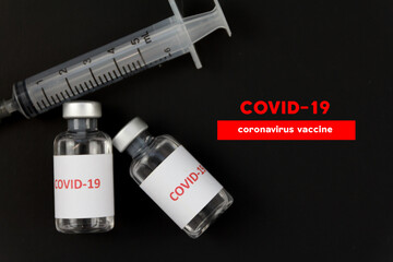 Corona virus vaccine in bottles. The medical concept.